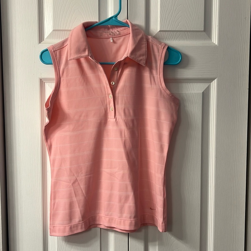 Light pink women’s Nike Dri-fit tank polo